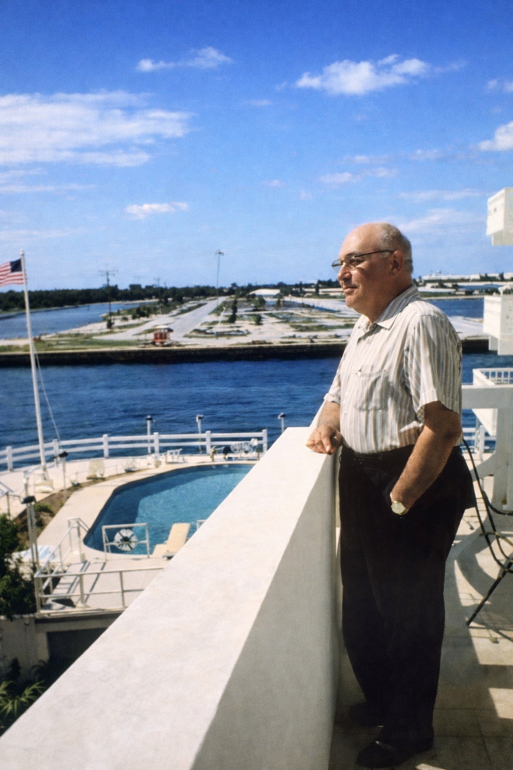 Early resident on balcony overlooking the Intracoastal